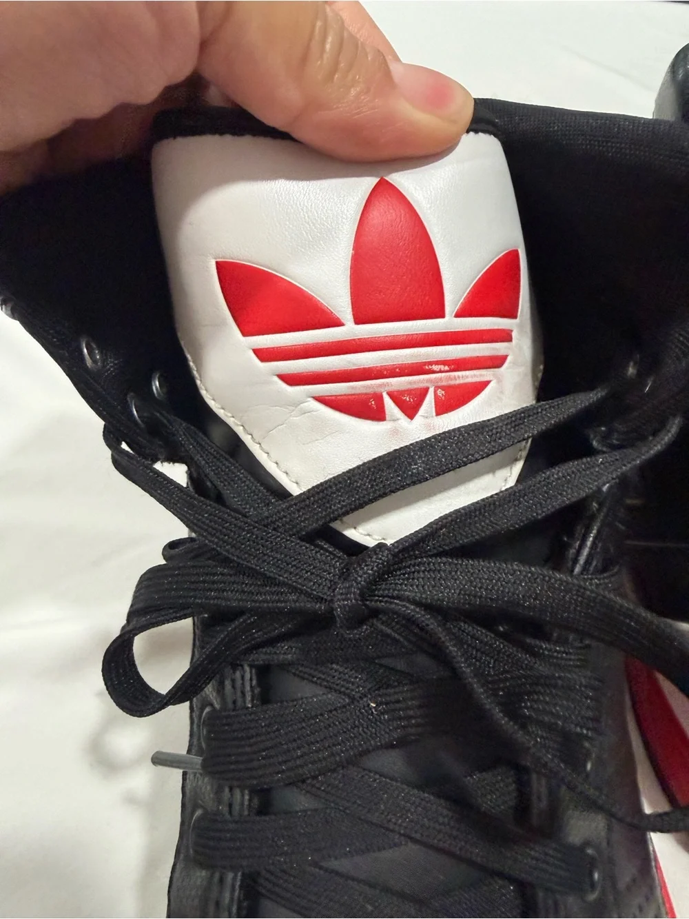 adidas Black and Red High-Top Sneakers